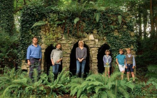 Her father, Dominic, with his wife Catherine and children